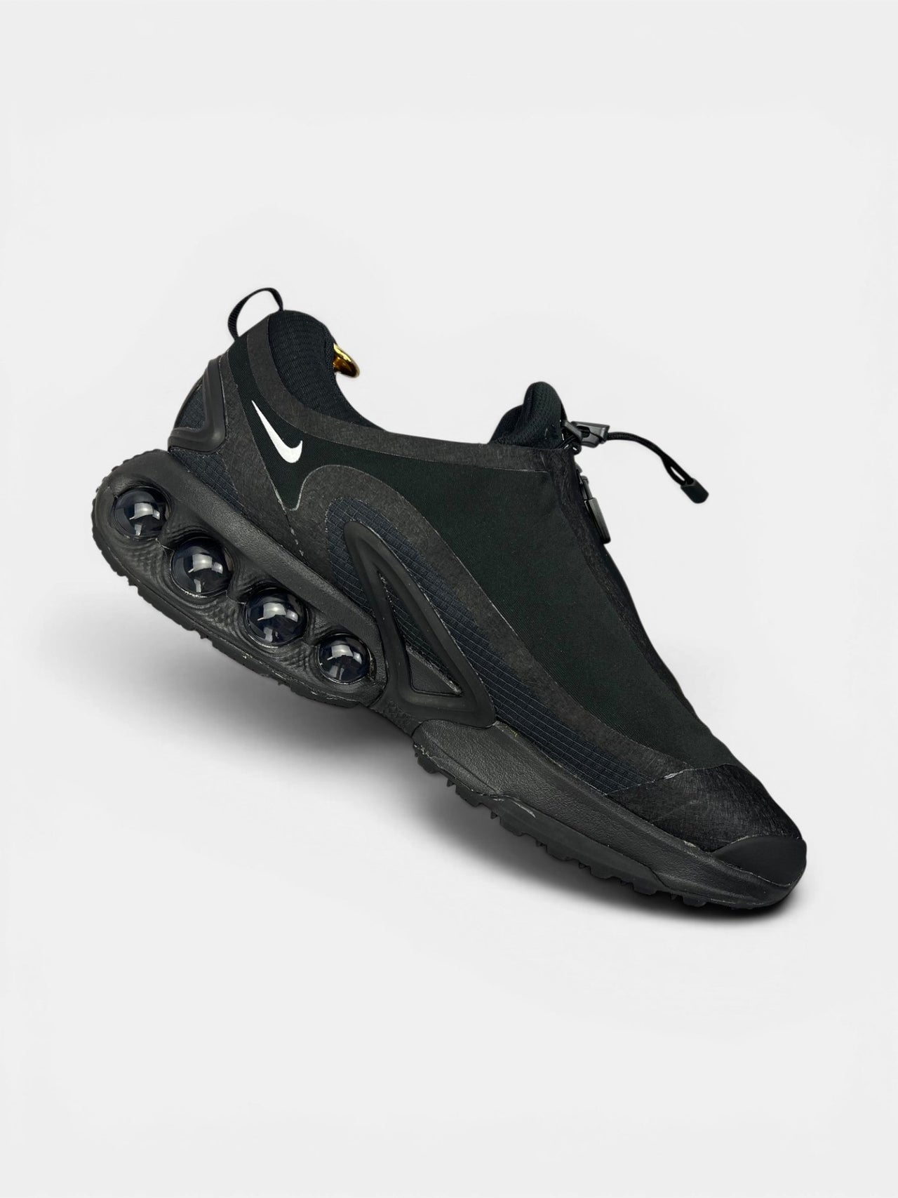 Nike Air Max Dn Roam Triple Black — buty sportowe męskie w bardzo dobrym stanie rozmiar 45, wewnętrzny panel lewego buta