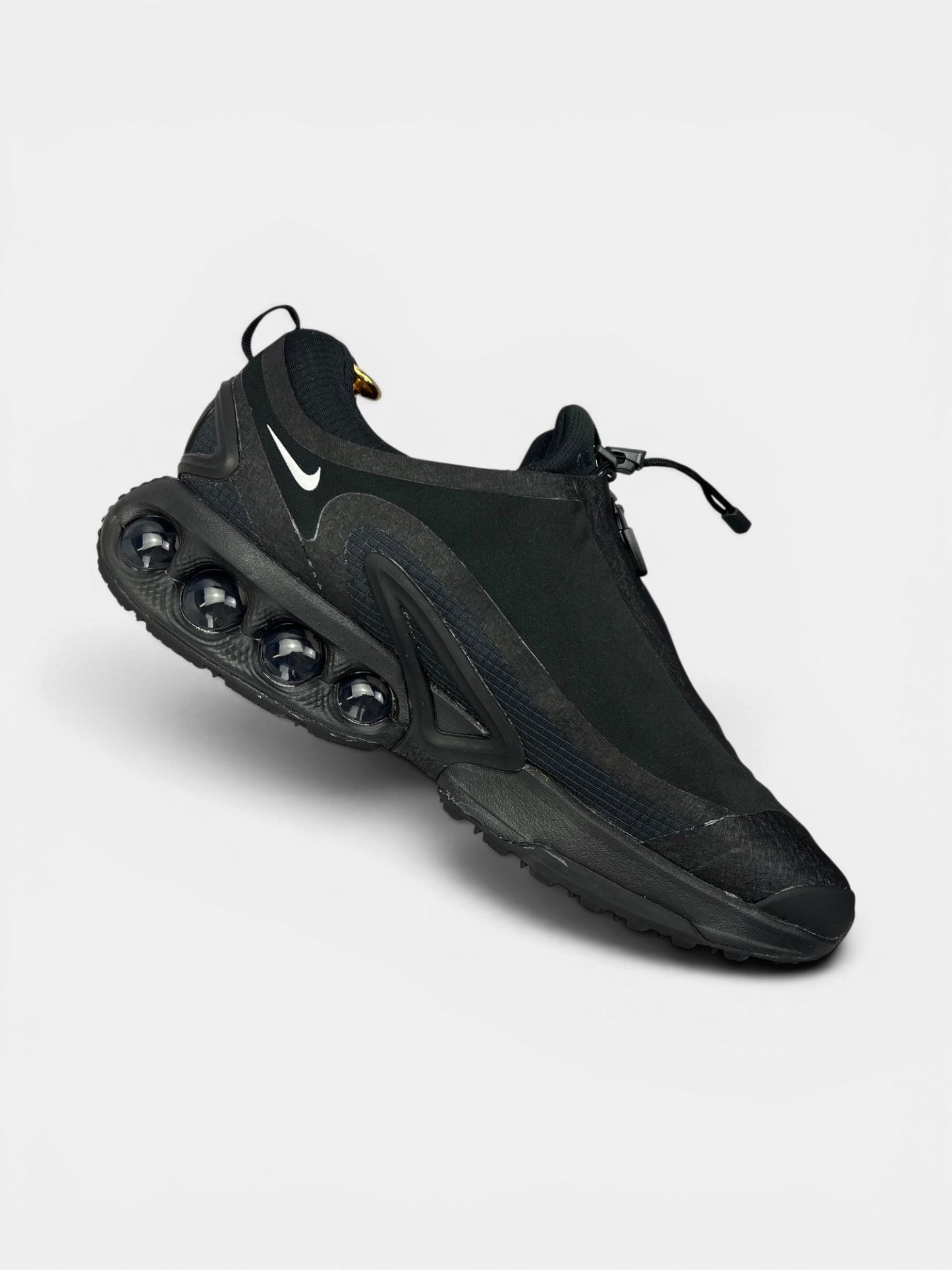 Nike Air Max Dn Roam Triple Black — buty sportowe męskie w bardzo dobrym stanie rozmiar 45, wewnętrzny panel lewego buta