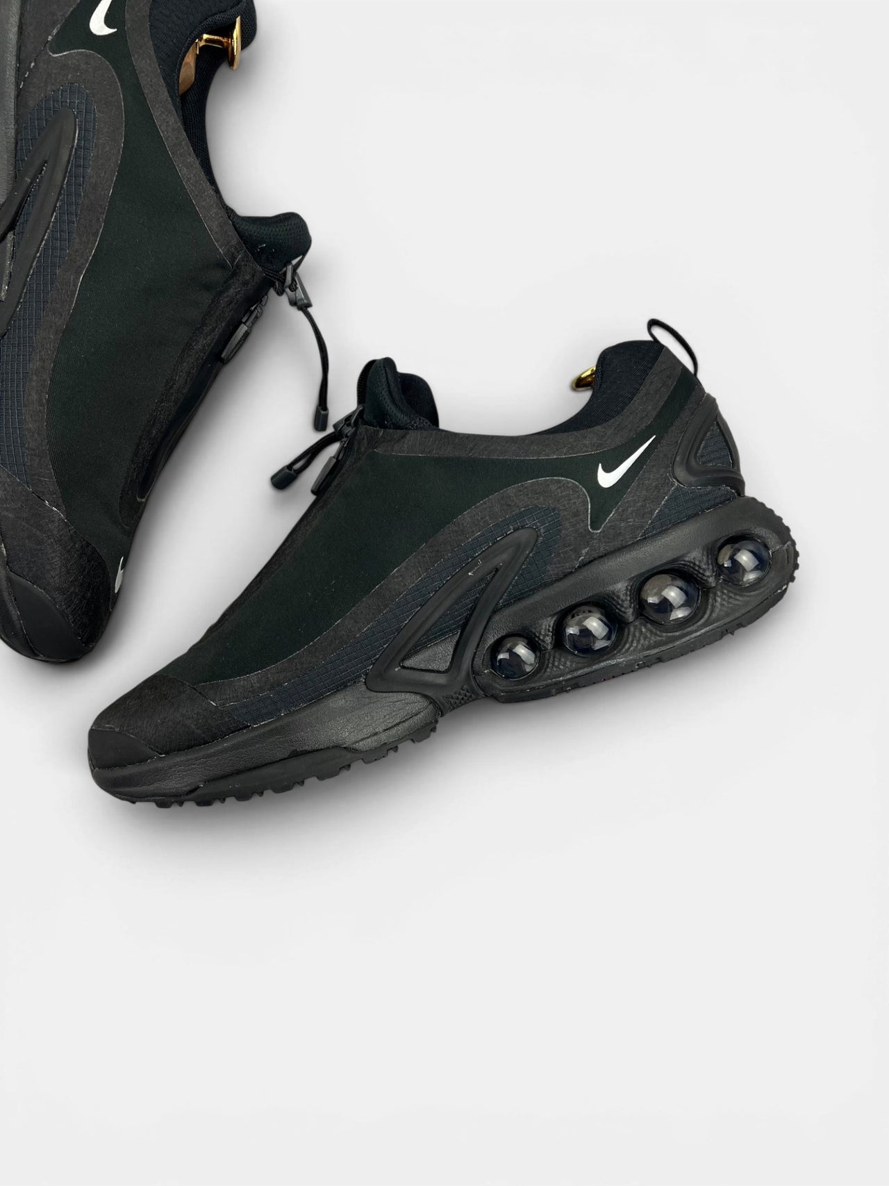 Nike Air Max Dn Roam Triple Black — buty sportowe męskie w bardzo dobrym stanie rozmiar 45, wewnętrzny panel prawego buta