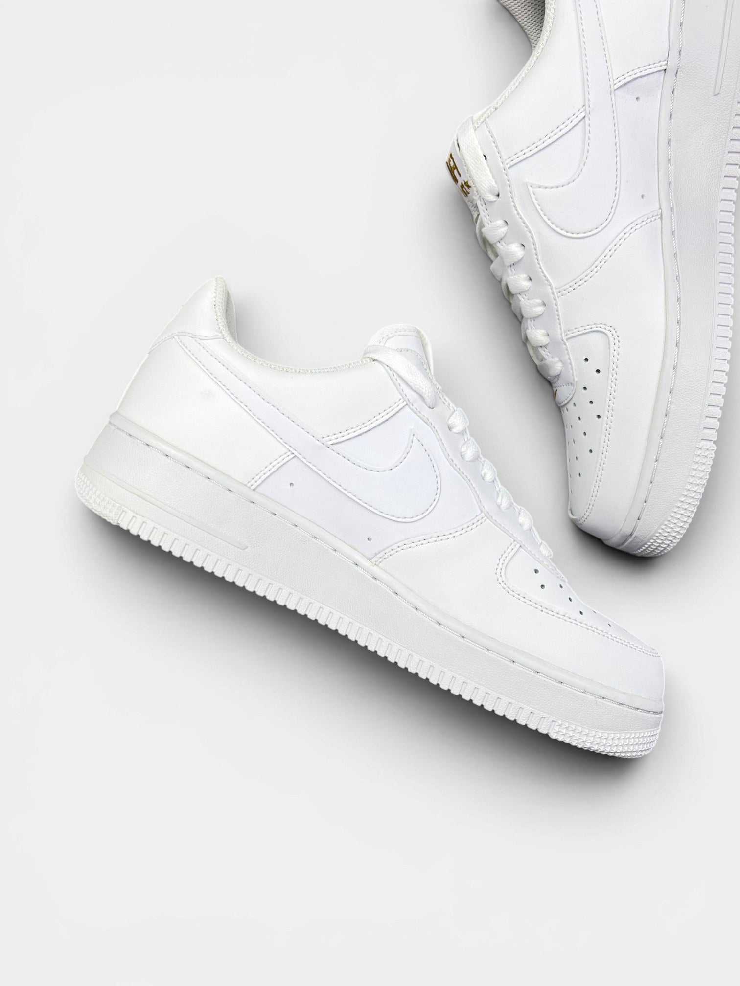 Nike Air Force 1 Low Crest Logo — buty sportowe męskie nowe rozmiar 42.5, wewnętrzny panel lewego buta