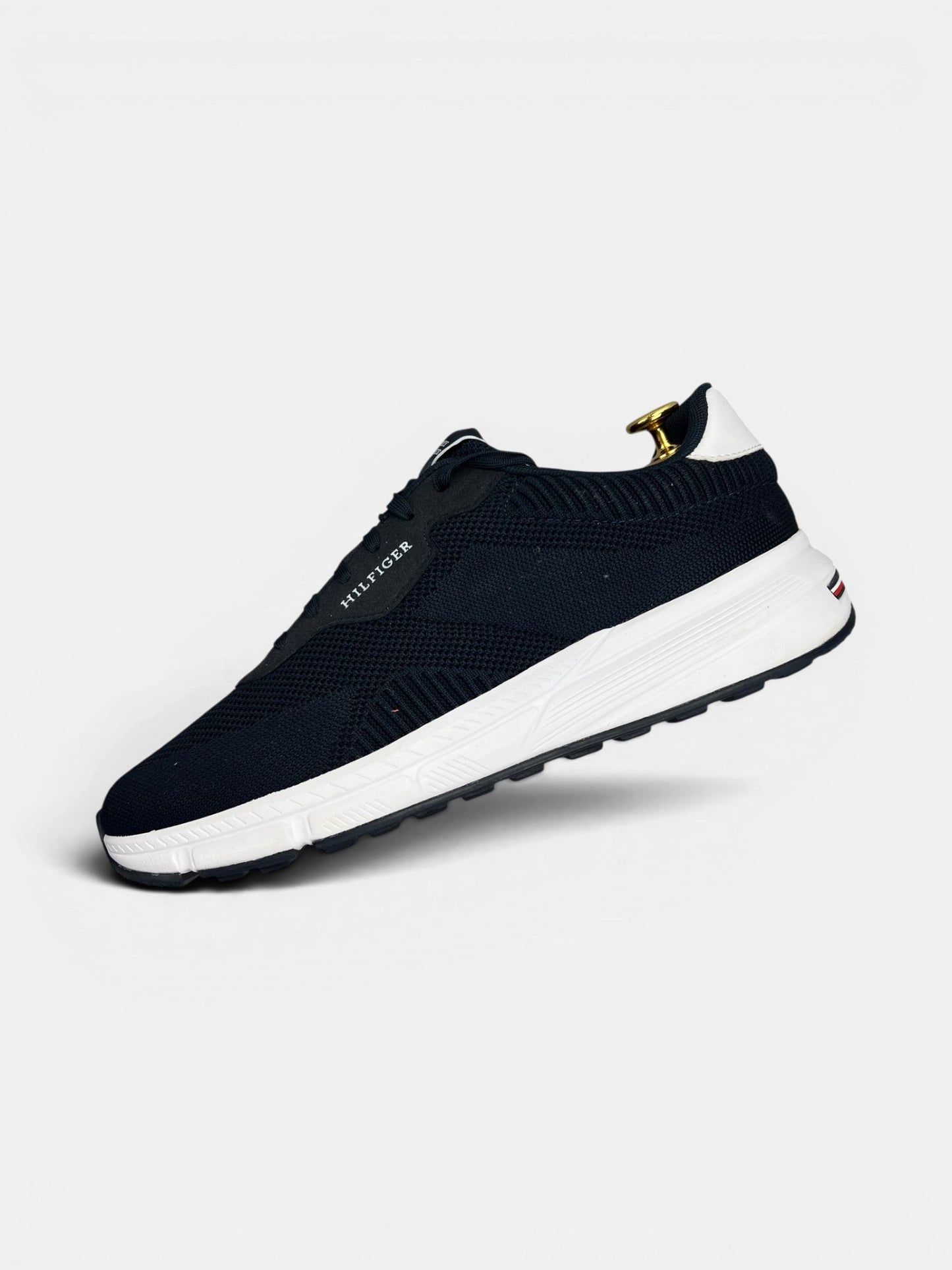 Tommy Hilfiger Lightweight RWB Knit — buty sportowe męskie w bardzo dobrym stanie rozmiar 44, zewnętrzny panel lewego buta