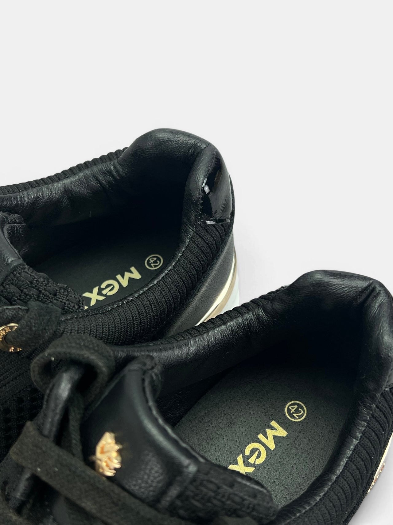 Mexx Glass — buty sportowe damskie w bardzo dobrym stanie rozmiar 42, zapiętki butów