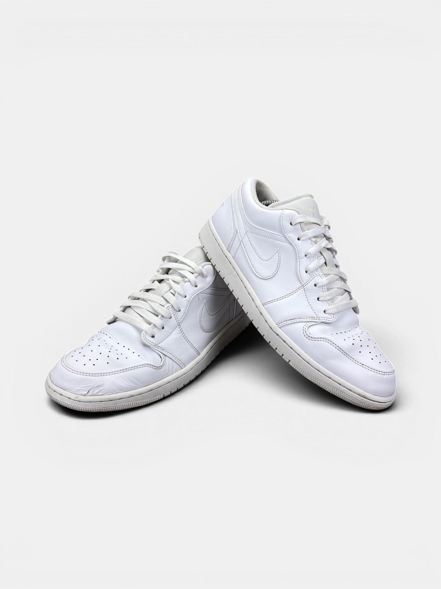 Nike Air Jordan 1 Low AJ1 Low Triple White — buty sportowe męskie w bardzo dobrym stanie rozmiar 44.5, boczny profil
