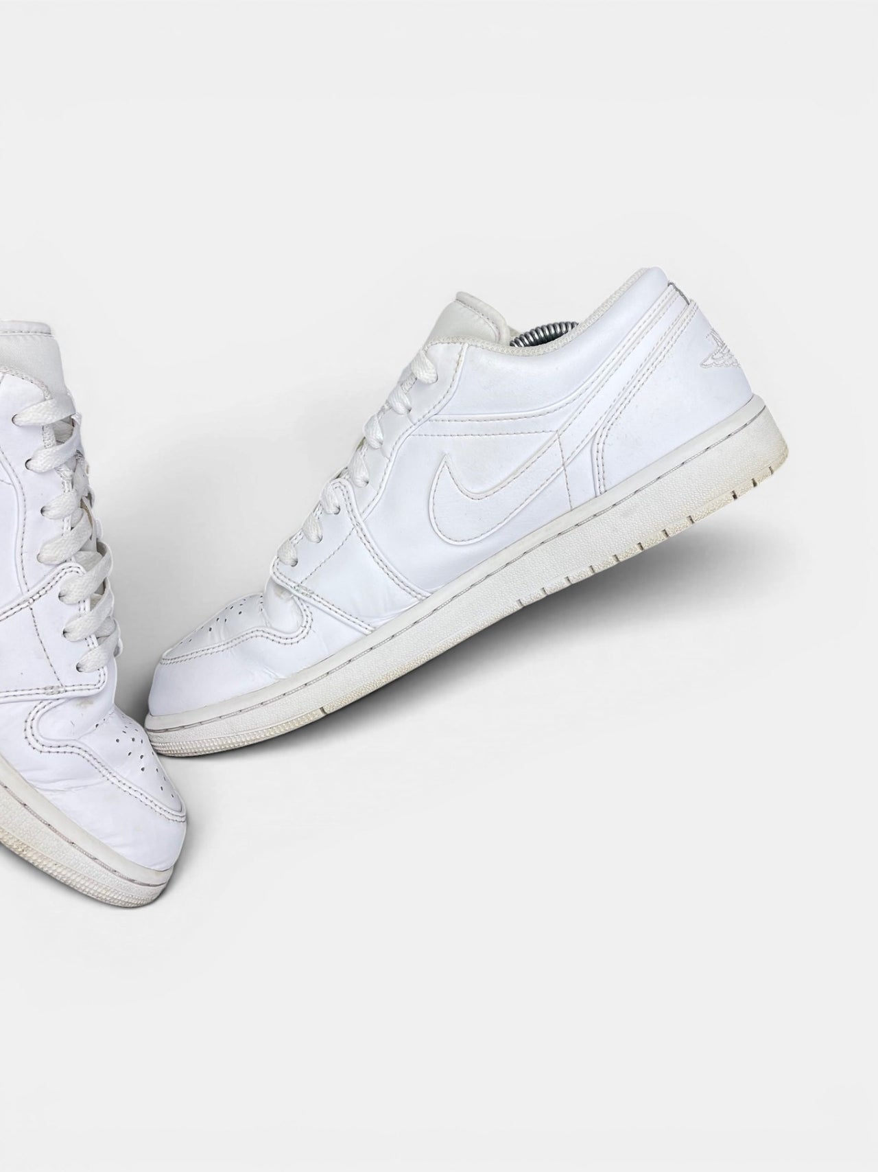Nike Air Jordan 1 Low AJ1 Low Triple White — buty sportowe męskie w bardzo dobrym stanie rozmiar 44.5, wewnętrzny panel prawego buta