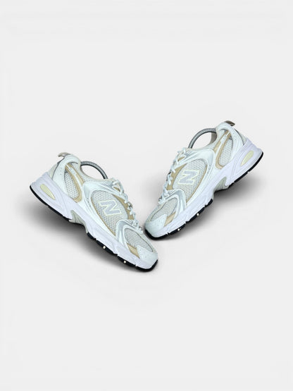 New Balance 530 — buty sportowe damskie w bardzo dobrym stanie rozmiar 40.5, widok z góry na zewnętrzną stronę butów