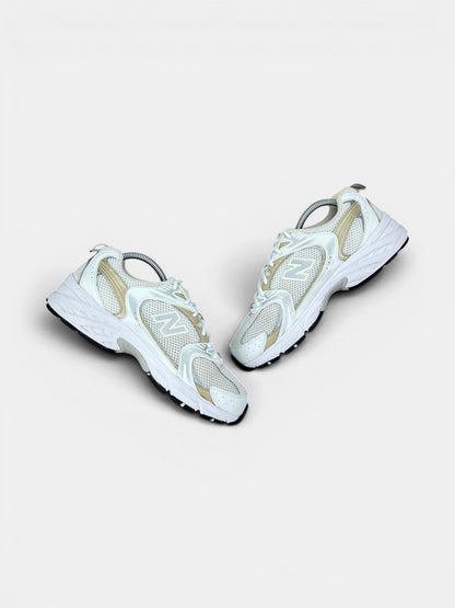 New Balance 530 — buty sportowe damskie w bardzo dobrym stanie rozmiar 40.5, zewnętrzny panel prawego buta