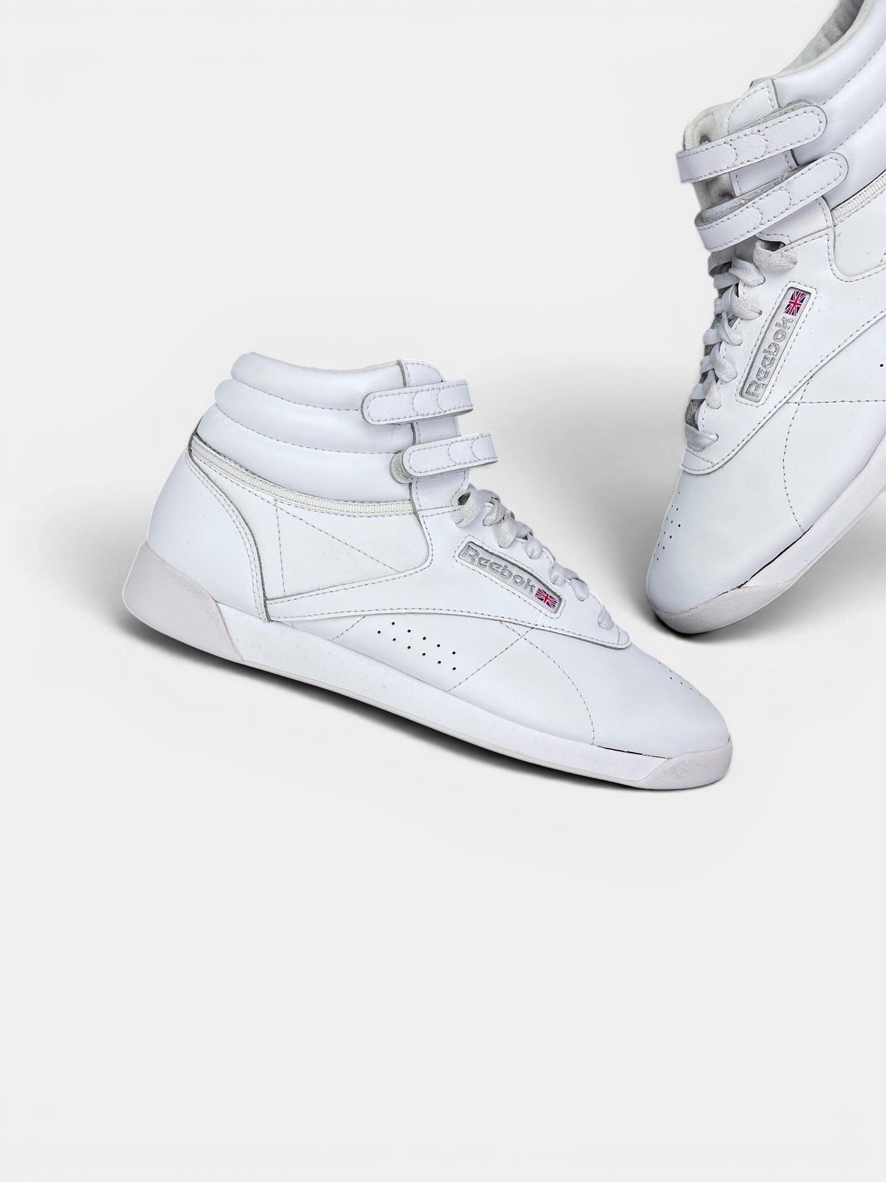 Reebok HiSneakers — buty sportowe damskie w bardzo dobrym stanie rozmiar 40.5, zewnętrzny panel lewego buta