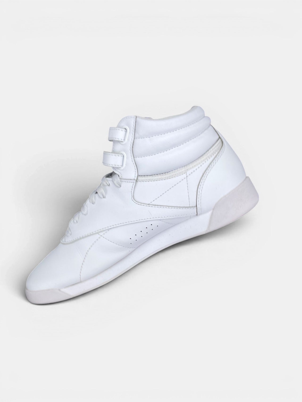 Reebok HiSneakers — buty sportowe damskie w bardzo dobrym stanie rozmiar 40.5, wewnętrzny panel prawego buta