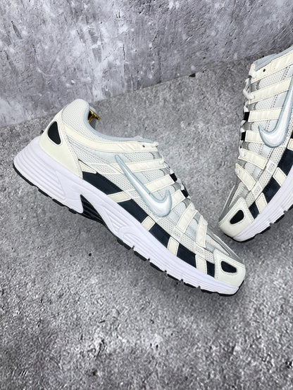 Nike P-6000 Sail Wolf Grey — buty sportowe męskie w bardzo dobrym stanie rozmiar 45.5, wewnętrzny panel lewego buta
