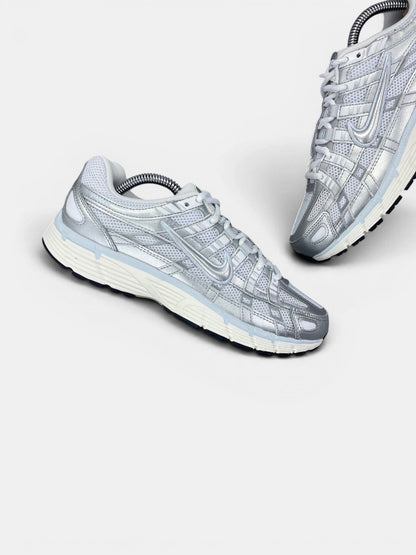 Nike P-6000 — buty sportowe damskie w bardzo dobrym stanie rozmiar 38.5, zewnętrzny panel lewego buta