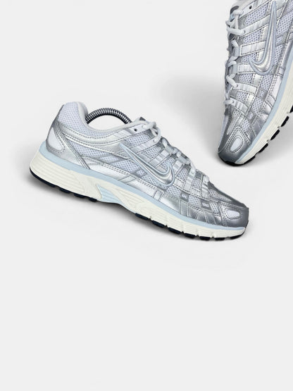 Nike P-6000 — buty sportowe damskie w bardzo dobrym stanie rozmiar 38.5, wewnętrzny panel lewego buta