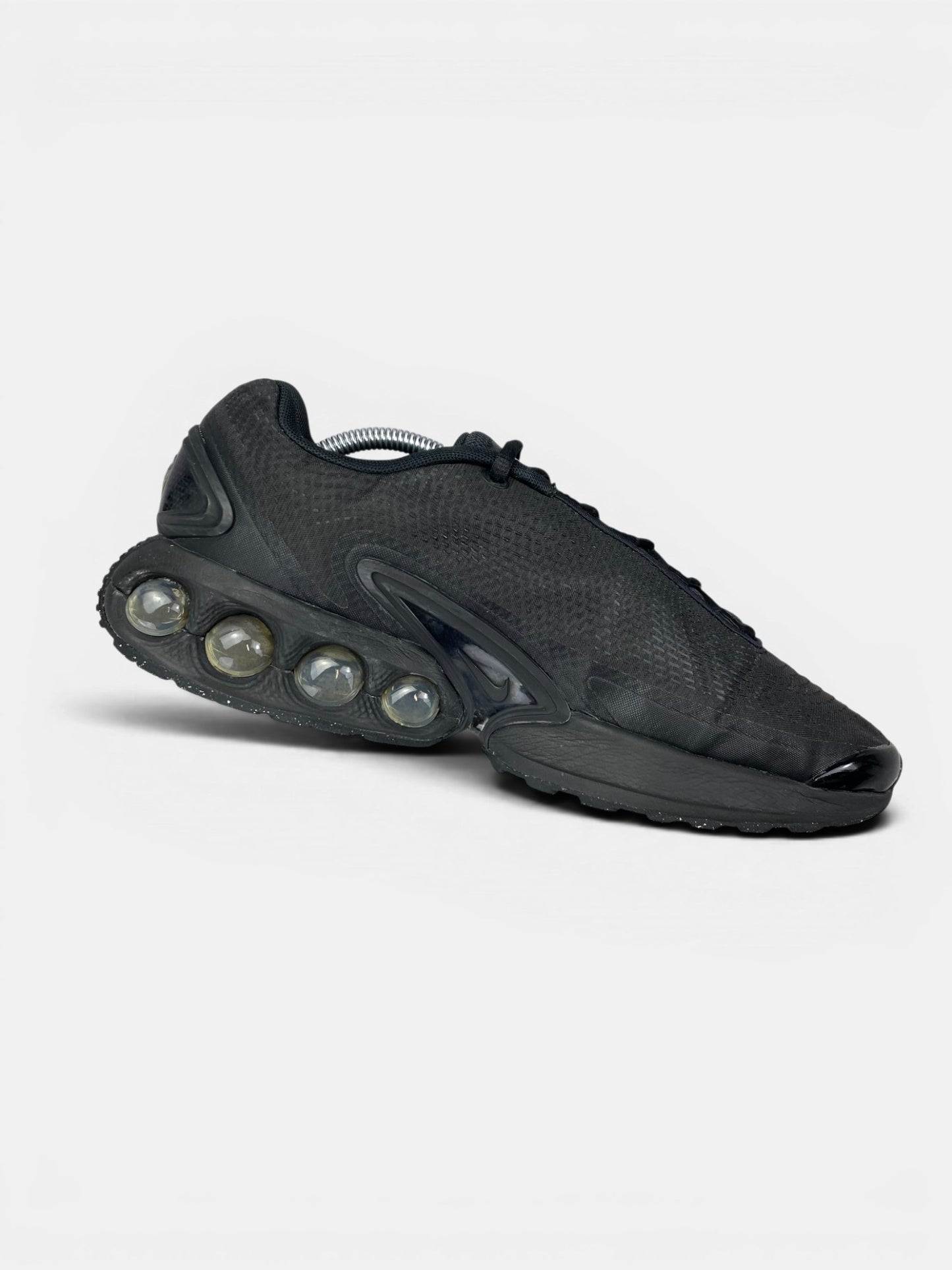 Nike Air Max Dn Black Metallic Grey — buty sportowe męskie w bardzo dobrym stanie rozmiar 45, wewnętrzny panel lewego buta