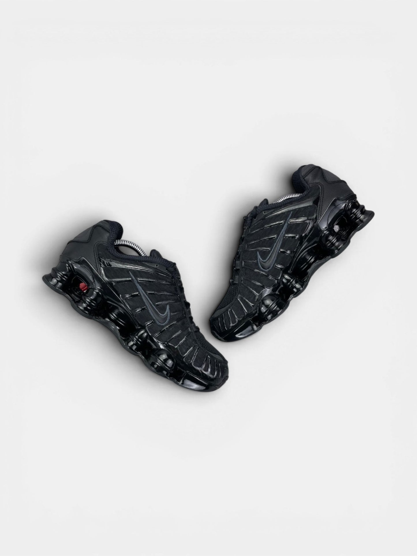 Nike Shox TL Black — buty sportowe męskie w bardzo dobrym stanie rozmiar 40, zewnętrzny panel prawego buta