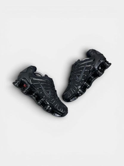 Nike Shox TL Black — buty sportowe męskie w bardzo dobrym stanie rozmiar 40, zewnętrzny panel prawego buta