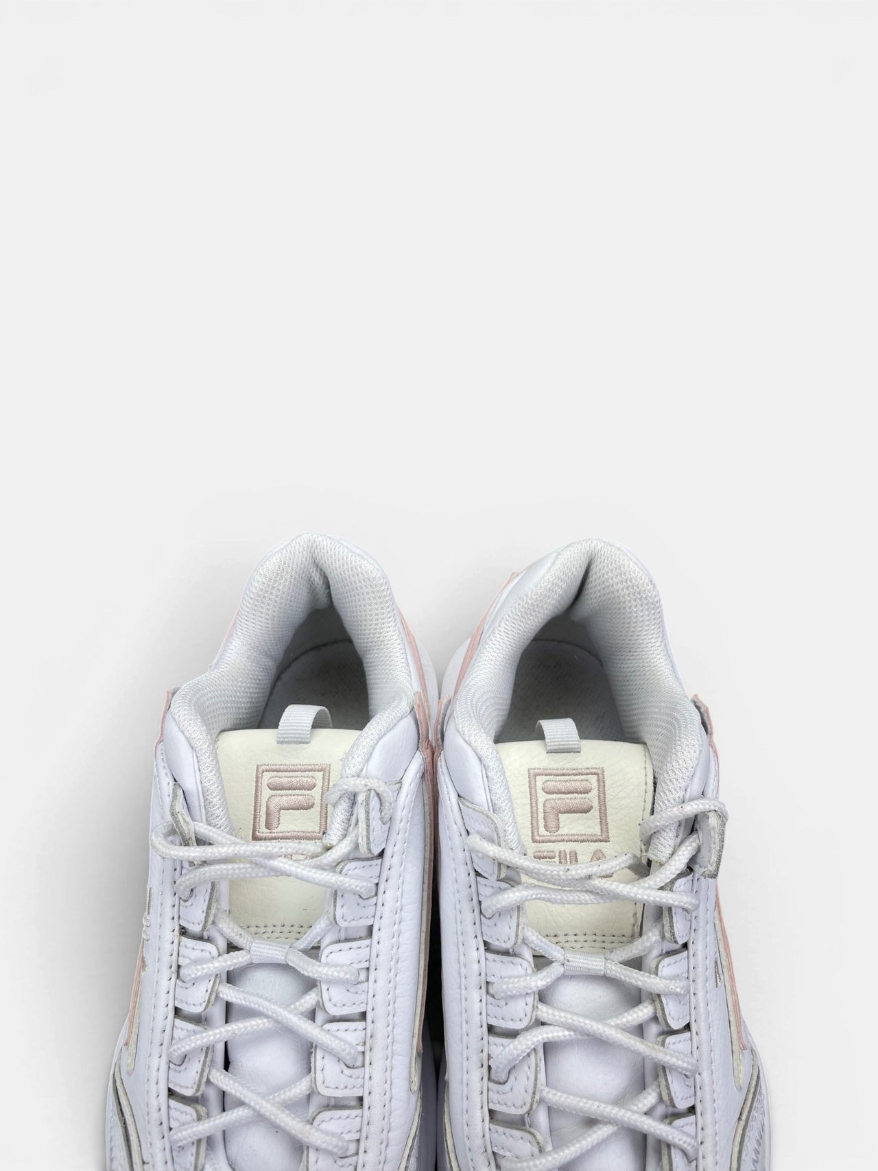 Fila Disruptor — buty sportowe damskie w bardzo dobrym stanie rozmiar 39, zapiętki butów
