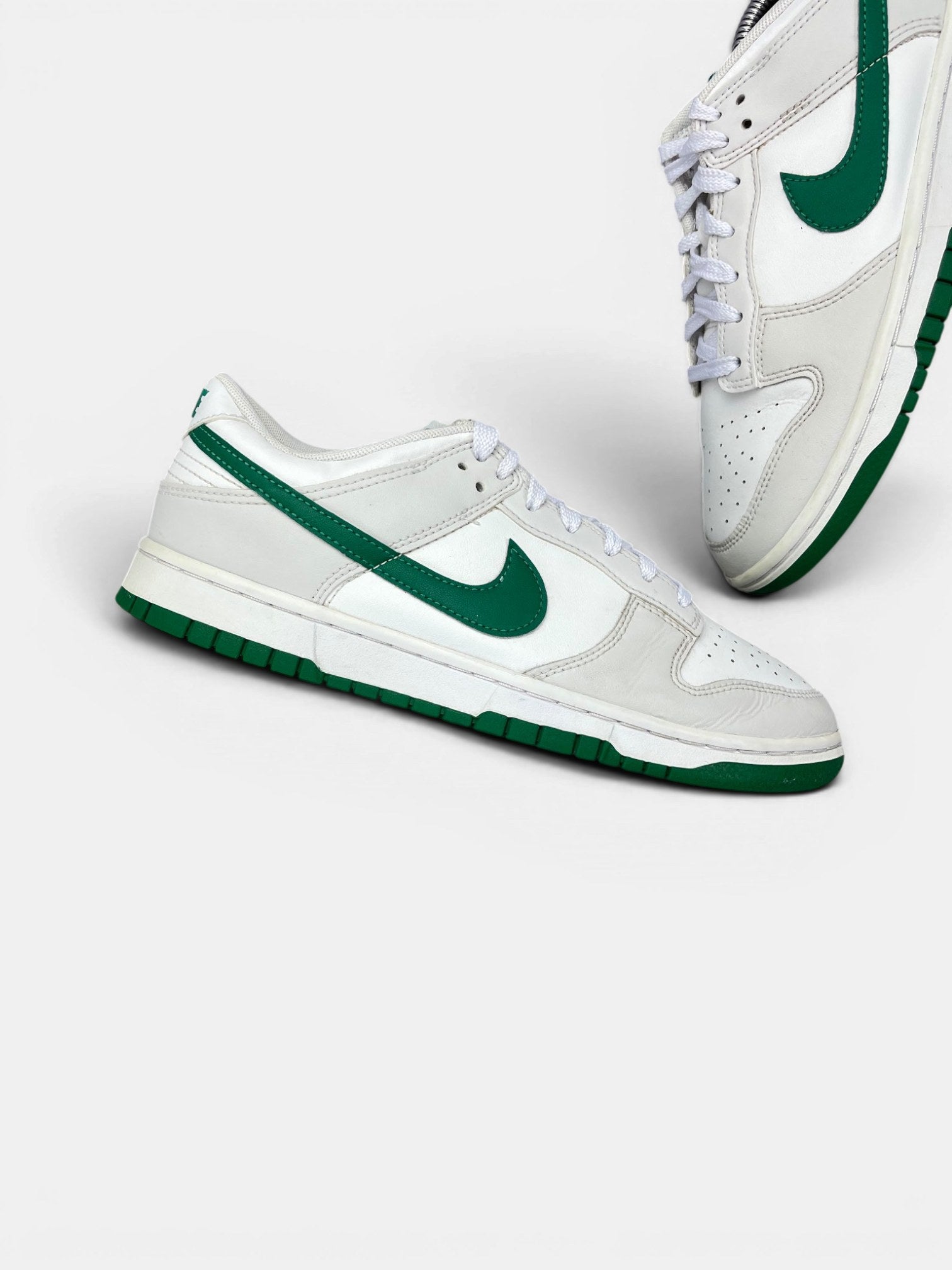 Nike Dunk Low Retro Malachite — buty sportowe męskie w bardzo dobrym stanie rozmiar 41, zewnętrzny panel prawego buta