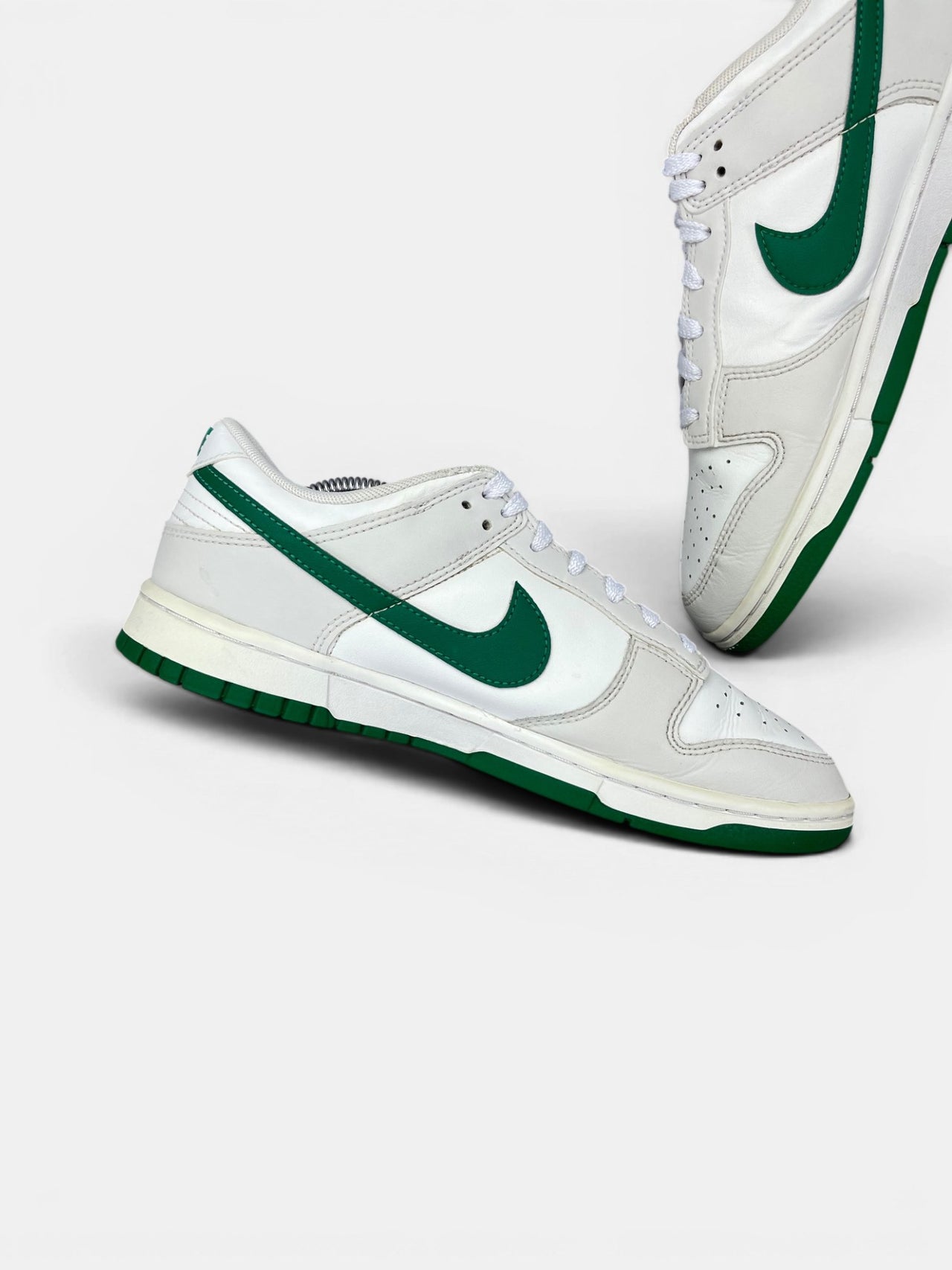 Nike Dunk Low Retro Malachite — buty sportowe męskie w bardzo dobrym stanie rozmiar 41, wewnętrzny panel lewego buta