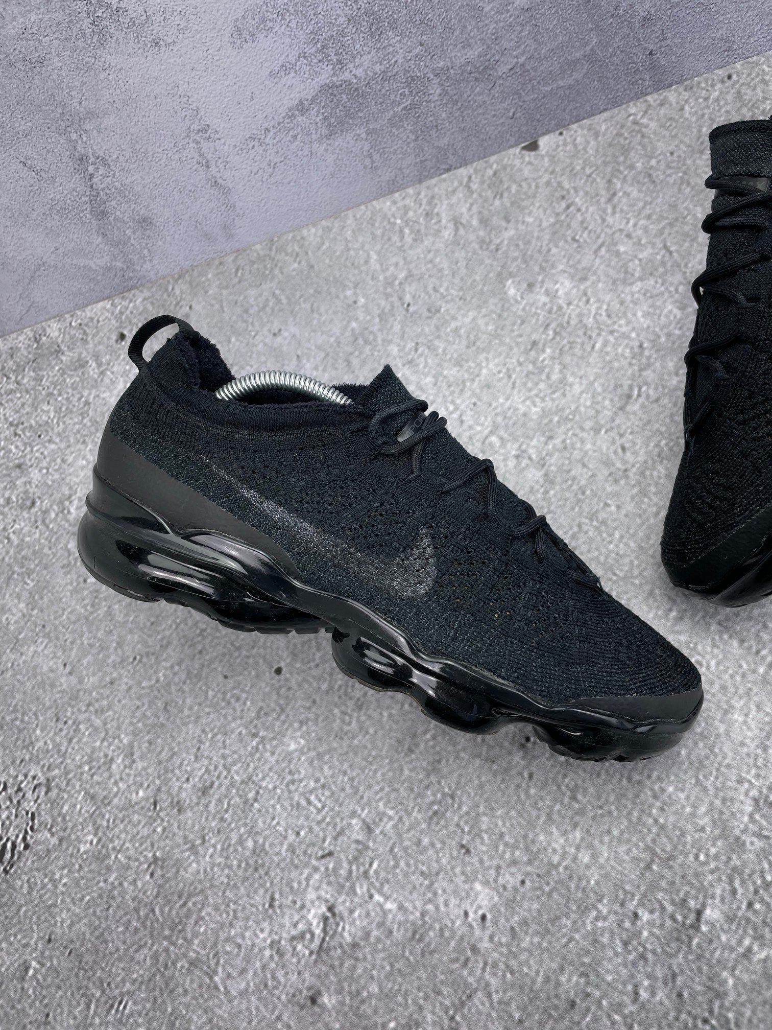 Nike Air VaporMax 2023 Flyknit Triple Black - buty sportowe, zewnętrzny panel lewego buta