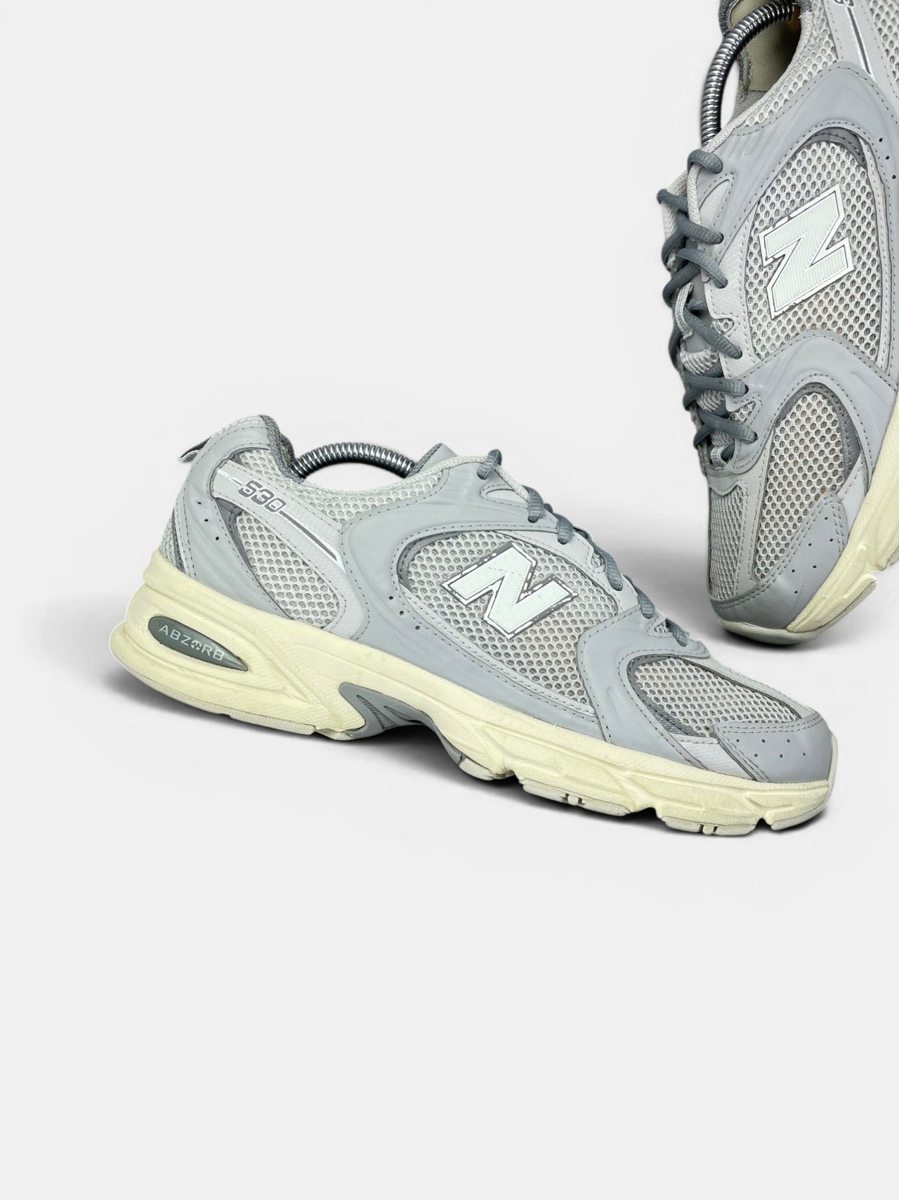 New Balance 530 ABZORB — buty sportowe męskie w bardzo dobrym stanie rozmiar 43, zewnętrzny panel prawego buta