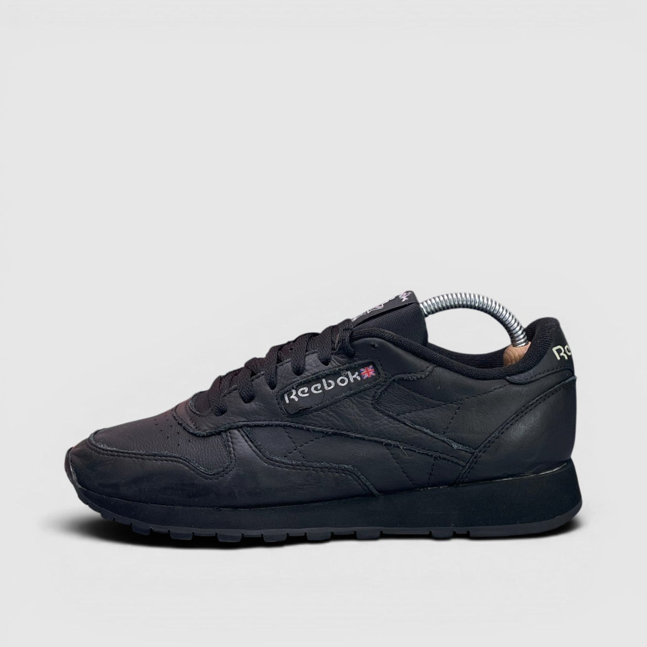 Reebok Glide — buty sportowe męskie w bardzo dobrym stanie rozmiar 42, boczny profil, lewa strona